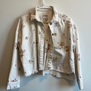 White and gold cropped jacket